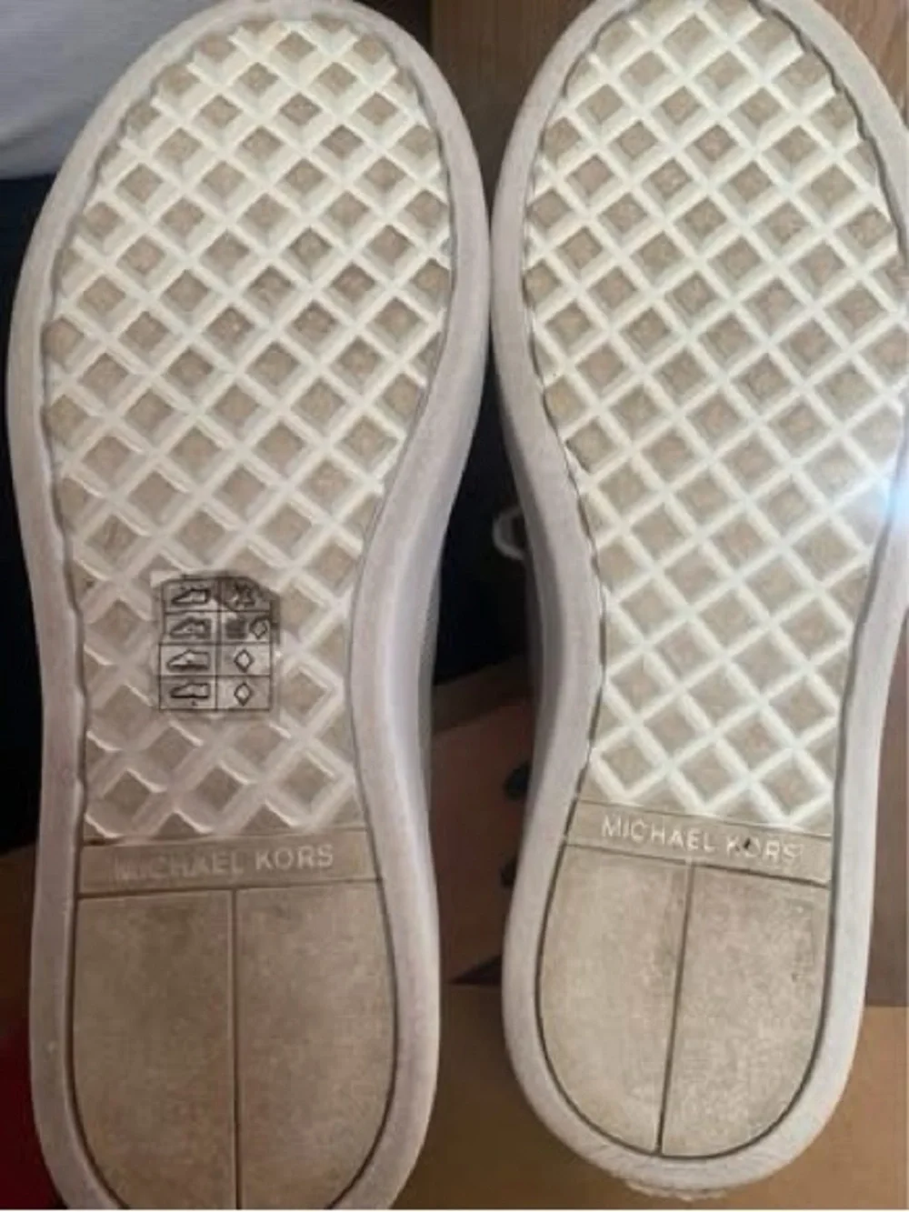 Women’s size 7 Michael Kors Sneakers with Gold Trim